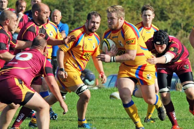 Amber Valley RUFC (Maroon), v Buxton.        
Buxton's Mike Pullen with the ball.