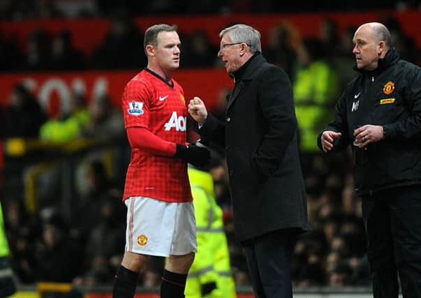 Wayne Rooney, left, and Sir Alex Ferguson did not always see eye to eye