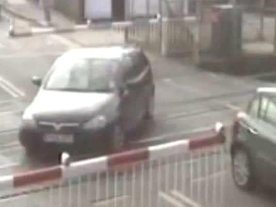 A car stuck on a level crossing in Leicestershire