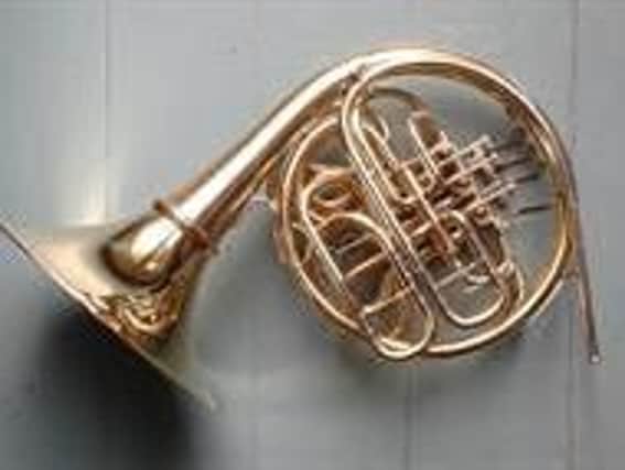 The stolen French horn turned up in an auction after it was stolen.