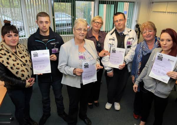 Derbyshire County Council Volunteer Passport Adult Care presentation at the TIn Hat Centre in Selston. Pictured are Anna Woof, Spencer Ibbotson, Janet Rice, Jan Harrison, Stefan Watkinson, Christine Nott, and Shona Sowersby.