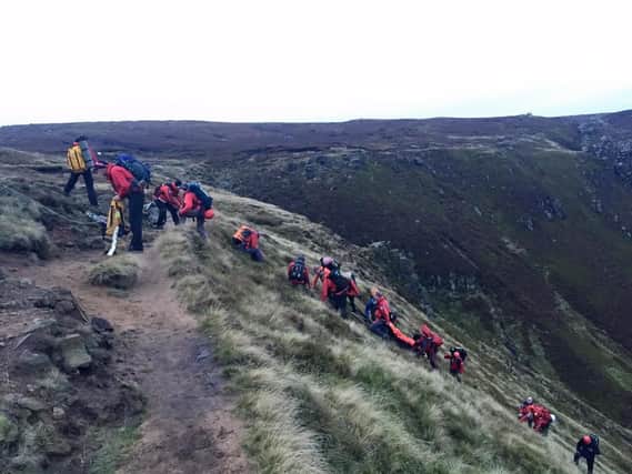 Buxton and Edale Mountain Rescue teams rescued woman after a leg injury while walking on Sunday.