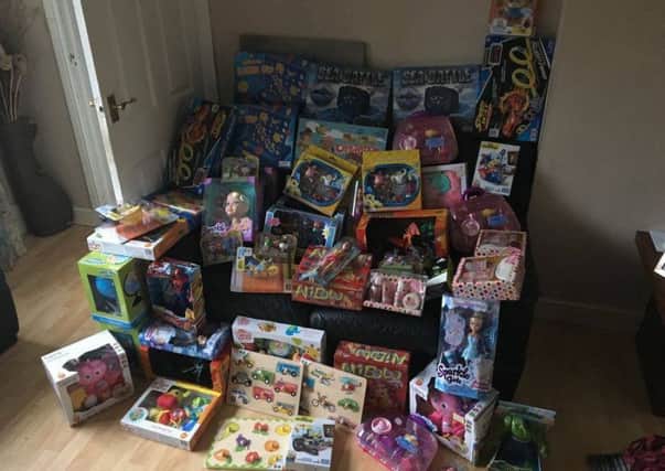 The toys bought with the money raised at a car meet