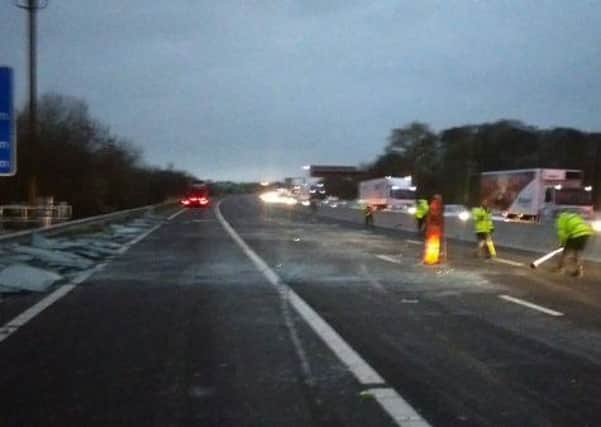 This was the scene earlier today on the M1 after a lorry shed its load of car windscreens (Credit: Derbyshire Police)