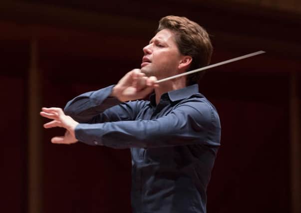 Julian Rachlin, conducting the Royal Liverpool Philharmonic Orchestra.