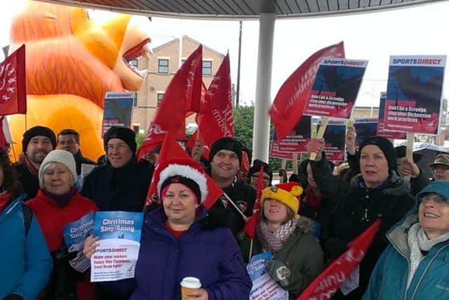 Members of Unite and churches from across the region joined forces outside Sports Direct in Mansfield to protest against 'scrooge like' working conditions