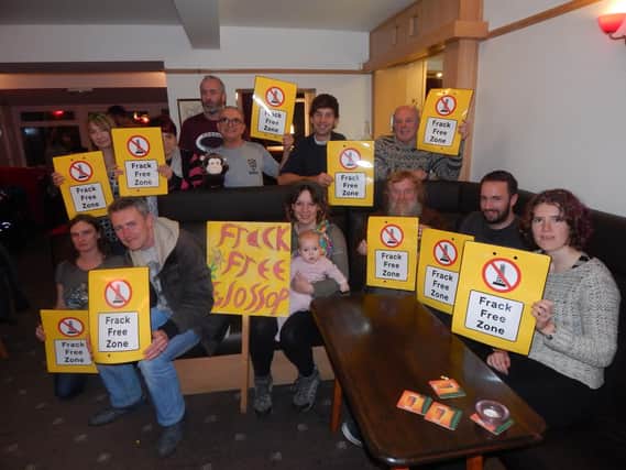 Greenpeace capaigners have called the government a 'pantomime villain' after pushing the Peaks closer to fracking licences.