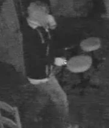 CCTV of a man police want to speak to in connection with a burglary at Brampton in Chesterfield