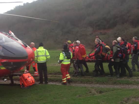An injured woman at Teggs Nose is rescued by air ambulance. Credit: Buxton MRT
