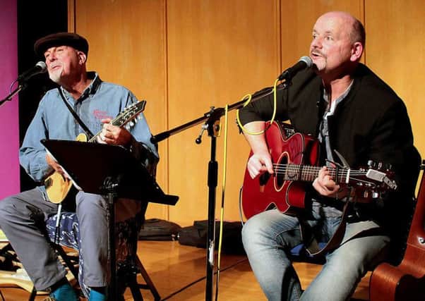 Anthony John Clarke and Dave Pegg perform at Chesterfield Library Theatre.