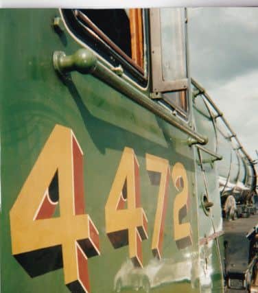 Photo by Keith Holford, taken in 2002, of The Flying Scotsman during its visit to the Buxworth Steam Group at Hartington Moor Showground.