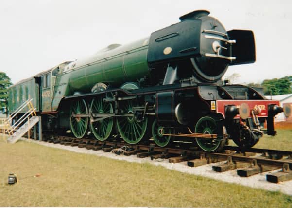 Photo by Keith Holford, taken in 2002, of The Flying Scotsman during its visit to the Buxworth Steam Group at Hartington Moor Showground.