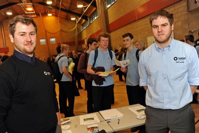 Mark Wagstaffe and Sam Lomas, from Tarmac, on their stand at the Buxton Community School Alumni Day.