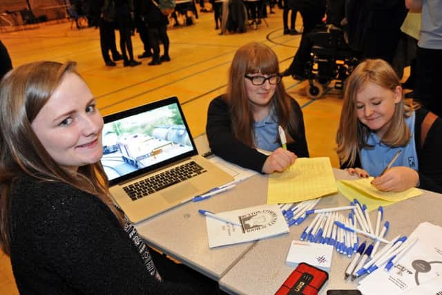 Natalie Wild, left, from Lomas Distribution, chats with year 11 pupils.
