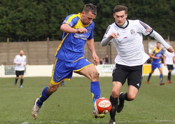 Shaun Tuton (left) in action for Buxton.