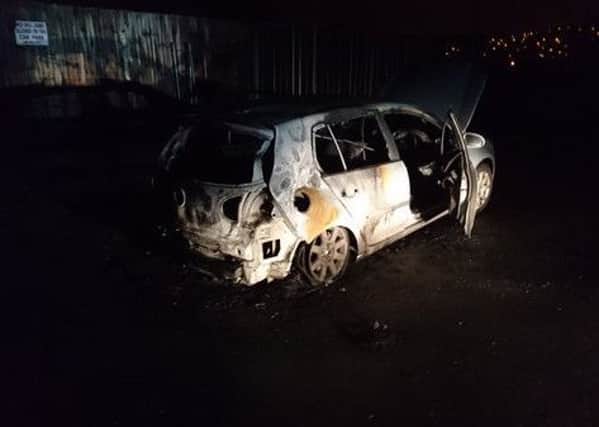Police are appealing for witnesses after this VW Golf was torched at New Mills Football Ground. Photo: Derbyshire Constabulary.