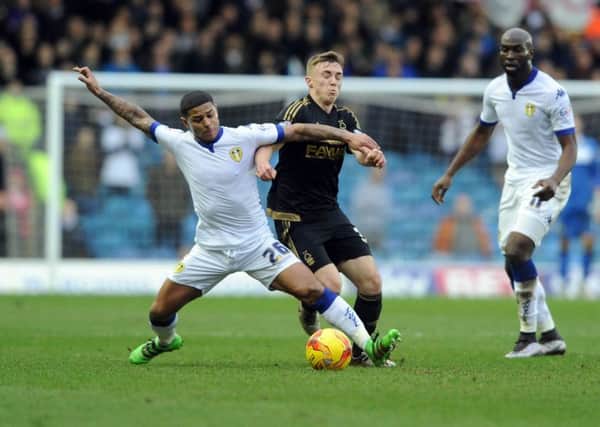 Date:6th February 2016. Picture James Hardisty.
Leeds United v Nottingham Forest, pictured Leeds United's Liam Birdcutt, tackles Nottingham Forest Ben Osborn.