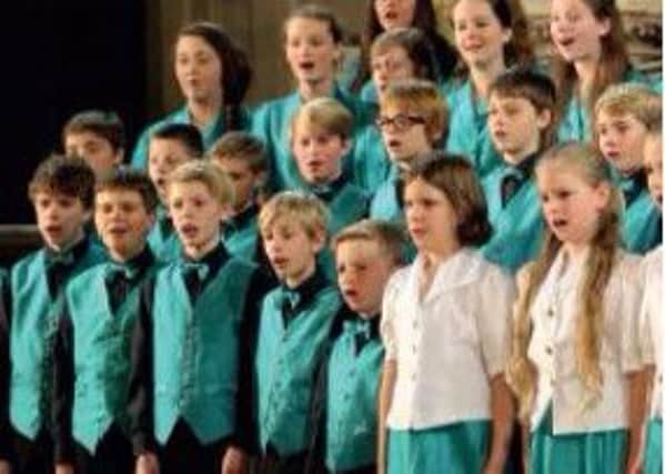 CONCERTS: The Kinder Children's Choirs of the High Peak will be performing a series of Christmas concerts around the High Peak and also with Russell Grant and tenor Russell Watson at the Bridgewater in the annual Raymong Gubbay Christmas spectacular. Photo submitted.