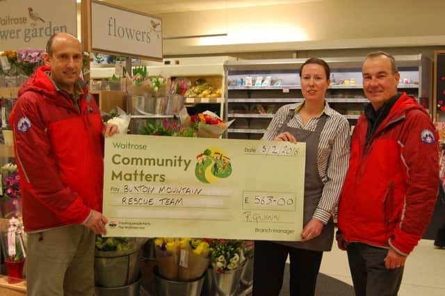 Buxton Mountain Rescue Team members, Roger Bennett and Rob Wymer, were pleased to visit Waitrose supermarket in Buxton this week toÂ receive a cheque for Â£563 from Community Matters organiser, Julie Atkinson.