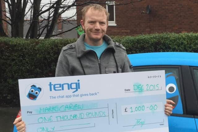 Rotherhams Mark Carew, of Herringthorpe, with his 1,000 Tengi prize.