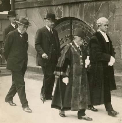 Buxton Advertiser archive, 1920s, Buxton civic leaders including the mayor, clerk of the borough and the 9th Duke of Devonshire (centre) in the Crescent outside the Old Hall Hotel
