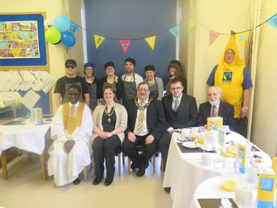 The photo shows the students and special guests including, from left, PHD student John Amoo-Bediako, Mayoress Charlotte Young and Mayor Stuart Young.