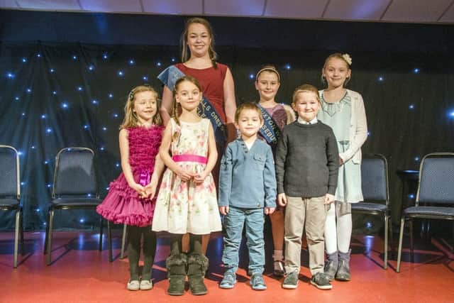 The 2015 Buxton Well Dressing Festival Royalty: Festival Queen Lilly-Anne Owen, Rosebud Bessie Morris, Pageboys William Austin and Joshua Owen, and Attendants Poppy Fleur Blackley, Phoebe Sherwin and Chloe Howe. Photo by Anna Phillips.