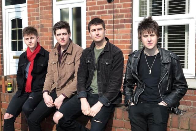 The Sherlocks outside 11 Chapel Street, Bolton On Dearne - which features on cover sleeve of new single Last Night. Photo: Glenn Ashley.