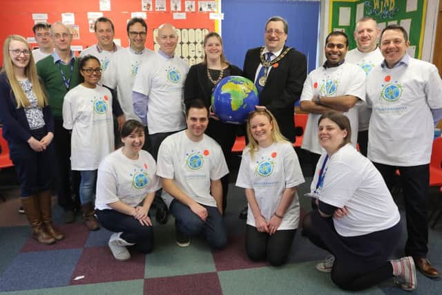 The Nestle Waters team with Mayor Stewart Young and teachers at World Water Day, Burbage Primary School Buxton