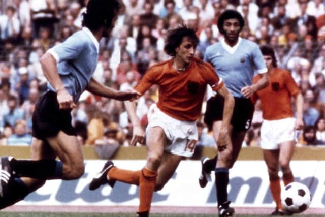 Johan Cruyff, pictured playing for Holland during the 1974 World Cup. The Dutch great died aged 68 today after a battle with cancer.