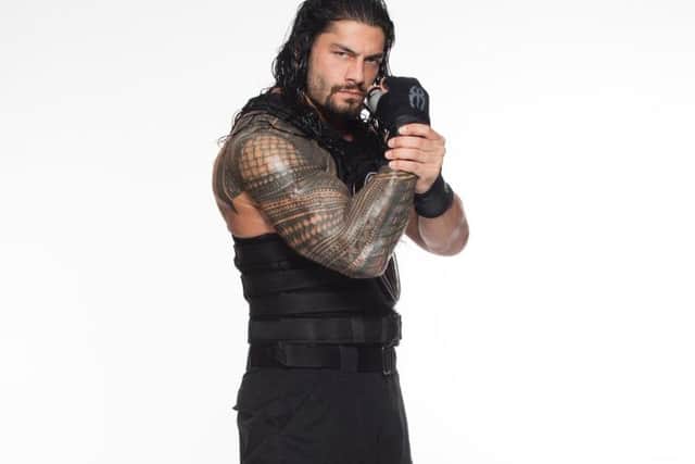 Main event superstar Roman Reigns,the new WWE World Heavyweight Champion