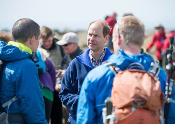HRH The Earl of Wessex in conversation with walk participants. Photo: Johnny Fenn.