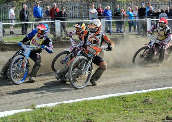 Photo by Ian Charles:
Heat 15: Oliver Greenwood (Red) and Ashley Morris (White) lead Max Clegg (Yellow/Black) and Ryan Blacklock (Red)
Buxton Addison Engineering Hitmen v Cradley Motor Market Heathens, National League KO Cup 29 May 2016