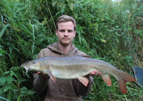 BARBELLOUS! -- talented angler Dan Ellis with a stunning-looking barbel that weighed in at 10lb 4 oz.