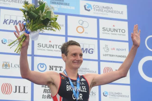 12 June 2016.......       Alistair Brownlee celebrates his win of the 2016 ITU World Triathlon Leeds on the podium in Millenium Square.  Picture Tony Johnson