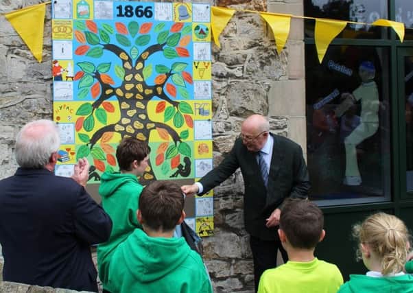 The 12th Duke of Devonshire, with assistance from Year 6 pupils George Wigham and Maddie Wager, unveiled a mural at the school.