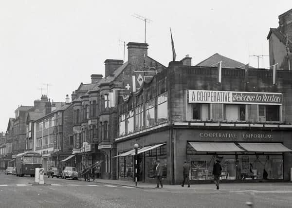 Buxton Advertiser archive, June 1966, Buxton's Co-op store decorated with flags and a banner to welcome visiting football supporters.