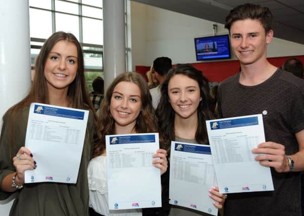 Students from Tupton Hall School celebrate their results last year.