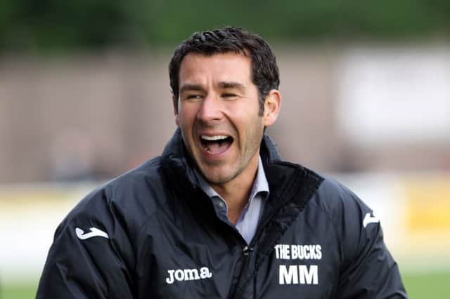 Buxton Manager Martin McIntosh - a happy manager.
Picture by Dan Westwell