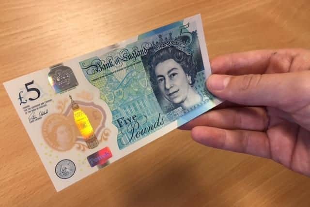 The new five pound notes came into circulation earlier this month.