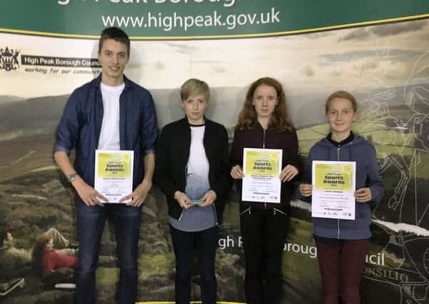 JUNIOR TEAM OF THE YEAR -- David Fryer-Winder, Luke Mamczur, Heather Wilshaw and Lauren Wilshaw representing the Buxton AC junior fell-running team at the ceremony.