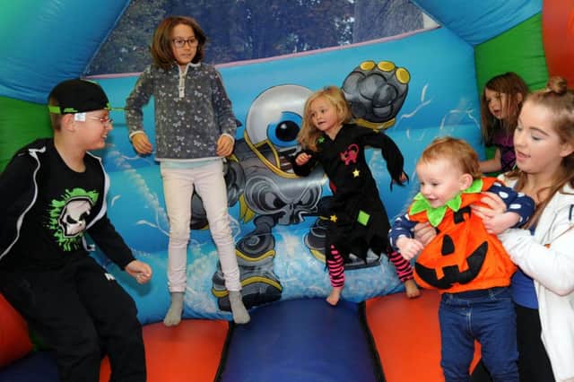 Youngsters enjoy the bouncy castle at a fundraiser for the Ronald McDonald House, organised by the Cobbles Wine Bar with Michelle Townsend and Richard Walker who benefitted from the charity themselves recently.