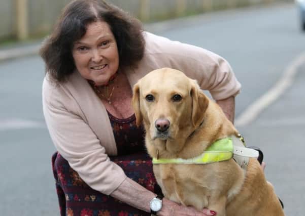 Sarah Wynn-Jones and her guide dog ushi. A cyclist nearly knocked her over in Buxton.