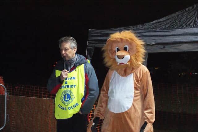 The Buxton Lions and the mascot ready to welcome crowds to the bonfire