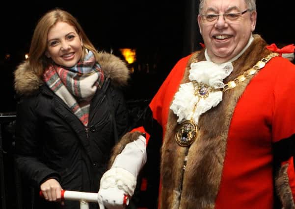 Panto star Lucy Dixon and mayor George Wharmby turn on this year's lights.
