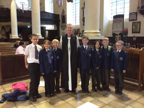 The school council meets with Bishop Alistair.