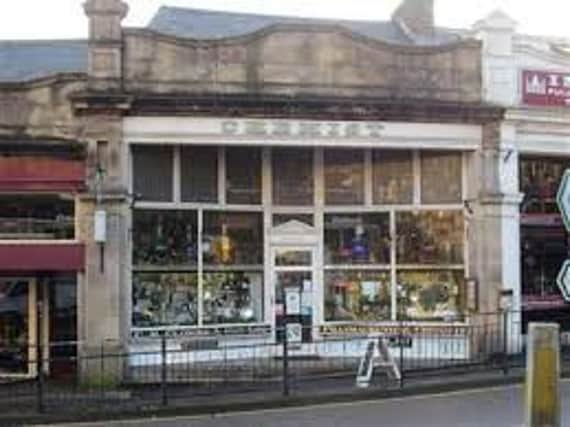 Burglars used a large rock to break a window at the Grade II listed chemist in buxton