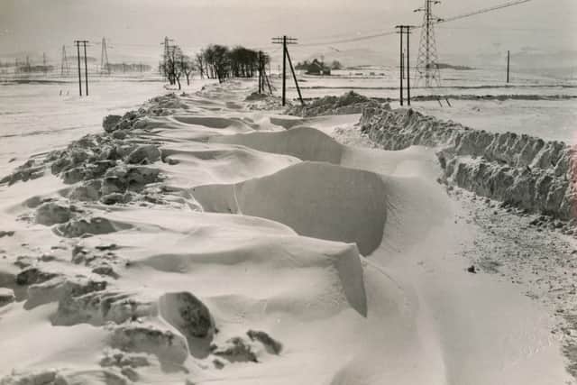Fresh drifts refill the previously cleared A6 near Dove Holes.