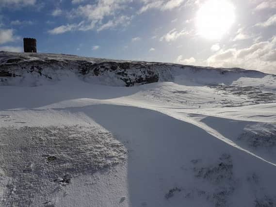 This picture of Solomon's Temple, Buxton, in the snow was taken by Neil Wain.