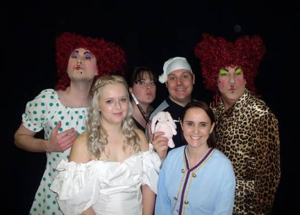 Bolsover Drama Group present 'Cinderella' Chris Peck (Gertrude), Michelle Shaw (Fairy Godmother), Dale Shaw (Buttons) and Paul Holland (Grizelda) - front Leanne Holloway (Cinderella) and Lyndsey Ashley (Prince Charming).